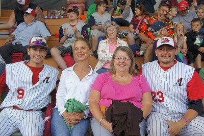 Thomas Hackimer and Dan Castro hang out with fans before the game.